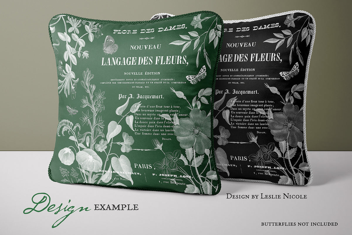 Two decorative pillows with a botanical design using vintage French flower illustrations and ephemera overlays.